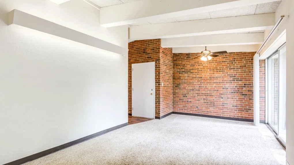 Interior with brick wall in Corinth Communities, Prairie Village, Kansas.